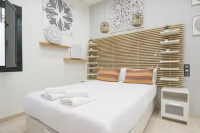 Cama o camas de una habitación en RentalSevilla Reposo
