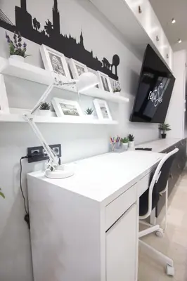 Una televisión o centro de entretenimiento en RentalSevilla Reposo