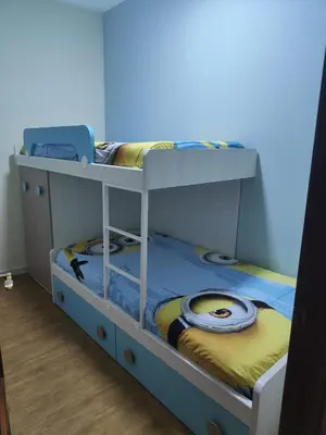 Cama o camas de una habitación en EL NIDO