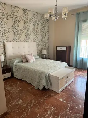 Cama o camas de una habitación en EL NIDO