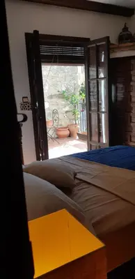 Cama o camas de una habitación en La Casa del Pintor - Estudio de Arte en Baeza