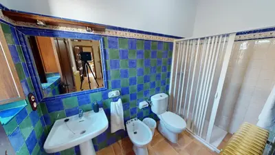 Un baño de Casa con encanto, gran capacidad alojamiento-24 personas
