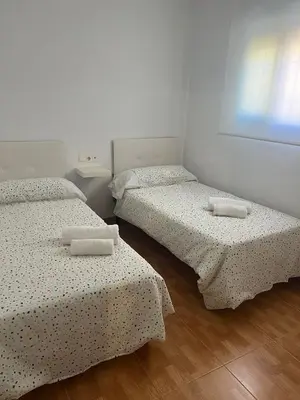Cama o camas de una habitación en Guadalora