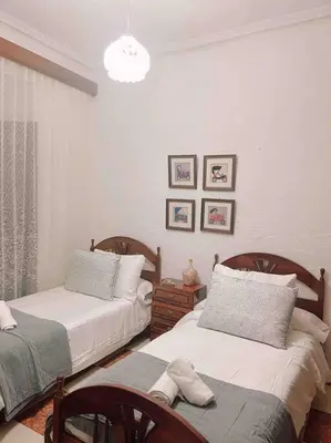 Cama o camas de una habitación en La Casa de Manolita