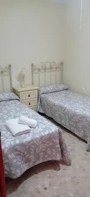 Cama o camas de una habitación en Apartamento en Sevilla