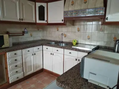 Una cocina o zona de cocina en Apartamento en Sevilla