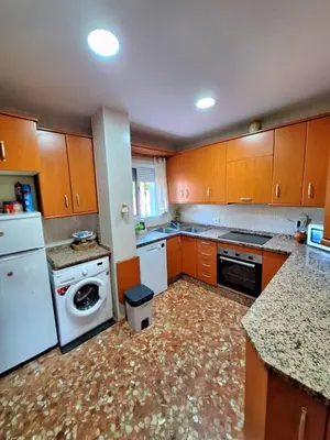 Una cocina o zona de cocina en La Cabaña de la Cigarra
