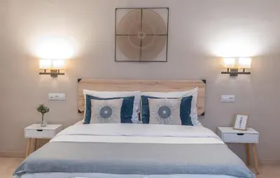 Cama o camas de una habitación en Apartamento céntrico Rincón de Ensueño Parking gratis