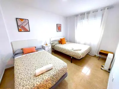 Cama o camas de una habitación en Paraná Center Apartment