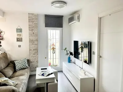 Una televisión o centro de entretenimiento en NUEVO!! Apartamento Lujo&Confort. PARKING