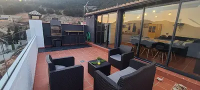 Un balcón o terraza de CASA CUEVA A-TIPICA