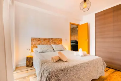 Cama o camas de una habitación en Apto céntrico, 2 aparcamientos privados, bicis