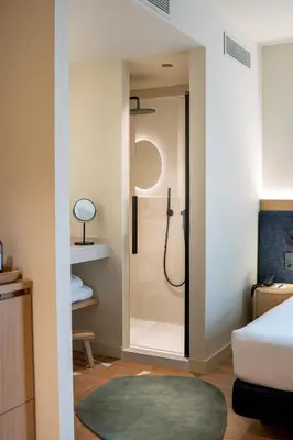 Cama o camas de una habitación en Ocean Drive Sevilla