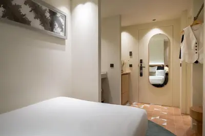 Cama o camas de una habitación en Ocean Drive Sevilla