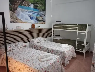 Cama o camas de una habitación en Alojamiento Rural Villa Rosarito