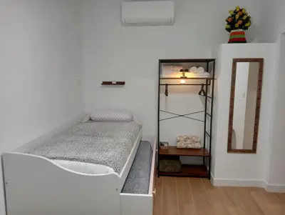 Cama o camas de una habitación en Alojamiento Rural Villa Rosarito