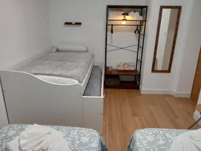 Cama o camas de una habitación en Alojamiento Rural Villa Rosarito