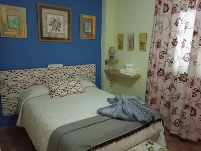 Cama o camas de una habitación en Alojamiento Rural Villa Rosarito