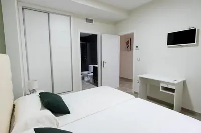 Cama o camas de una habitación en CASA CON PATIO