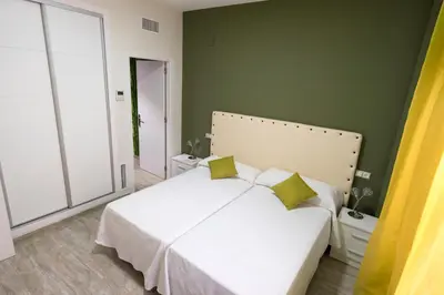 Cama o camas de una habitación en CASA CON PATIO
