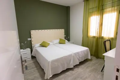Cama o camas de una habitación en CASA CON PATIO