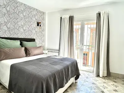 Cama o camas de una habitación en Hispalis rooftop Alameda Hércules