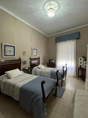 Cama o camas de una habitación en Vivienda La Puerta del Perdon
