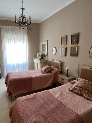 Cama o camas de una habitación en Vivienda La Puerta del Perdon