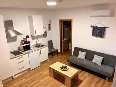 Una cocina o zona de cocina en Apartamentos EL PELIGRO 1 El CONJURO