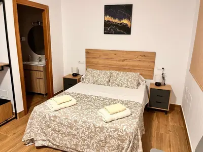 Cama o camas de una habitación en Apartamentos El PELIGRO 3 LA CUEVA