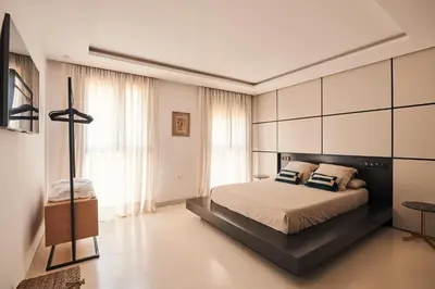 Cama o camas de una habitación en San Nicolas Luxury Home with prívate terrace