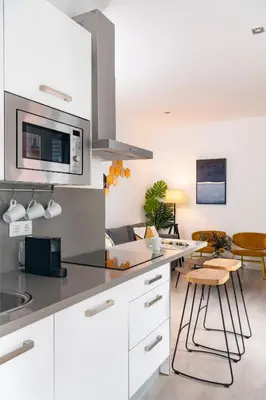 Una cocina o zona de cocina en Correduría Suites Apartments