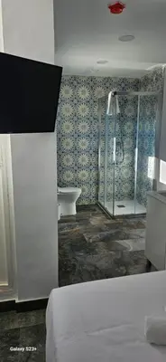Cama o camas de una habitación en HOSTAL NERVION