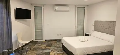Cama o camas de una habitación en HOSTAL NERVION