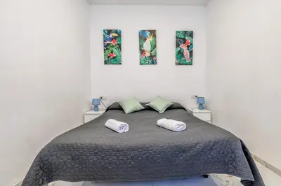 Cama o camas de una habitación en Living Cordoba Apartamentos