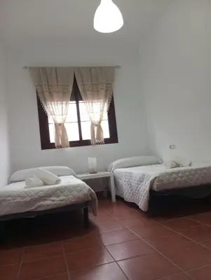 Cama o camas de una habitación en VILLA BILBILIS con piscina privada, barbacoa y parking