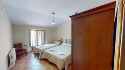 Cama o camas de una habitación en CASA RURAL SOLARIEGA DE LABRANZA