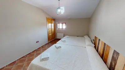 Cama o camas de una habitación en CASA RURAL SOLARIEGA DE LABRANZA