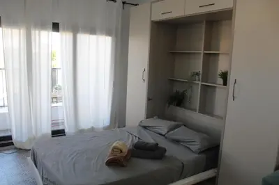 Cama o camas de una habitación en Honey Studio
