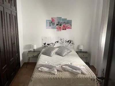 Cama o camas de una habitación en APARTAMENTO LA MAGDALENA
