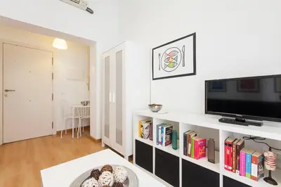 Una televisión o centro de entretenimiento en Peral Home Cozy Apartment