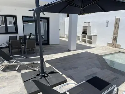 Un patio o zona al aire libre en Villa La Fuente