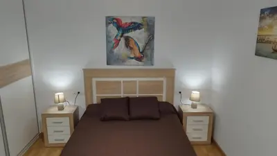 Cama o camas de una habitación en Apartamento Fuente del Genil.