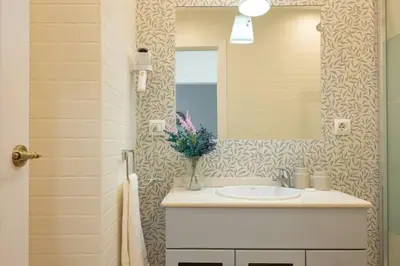 Un baño de Juan de la Encina Central Suite