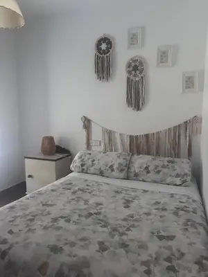 Cama o camas de una habitación en CASERIO LA SEVILLANA