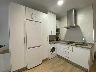 Una cocina o zona de cocina en Apartamento Andalucía Centro II