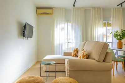Una televisión o centro de entretenimiento en Bustos Tavera Suite