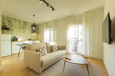 Una televisión o centro de entretenimiento en Bustos Tavera Suite