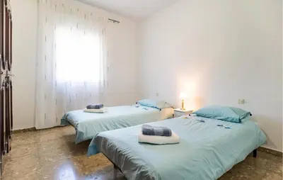 Cama o camas de una habitación en 4 Bedroom Beautiful Home In Periana