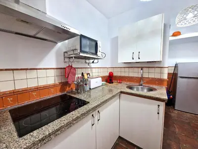Una cocina o zona de cocina en DS Realejo-Casco Histórico con aparcamiento